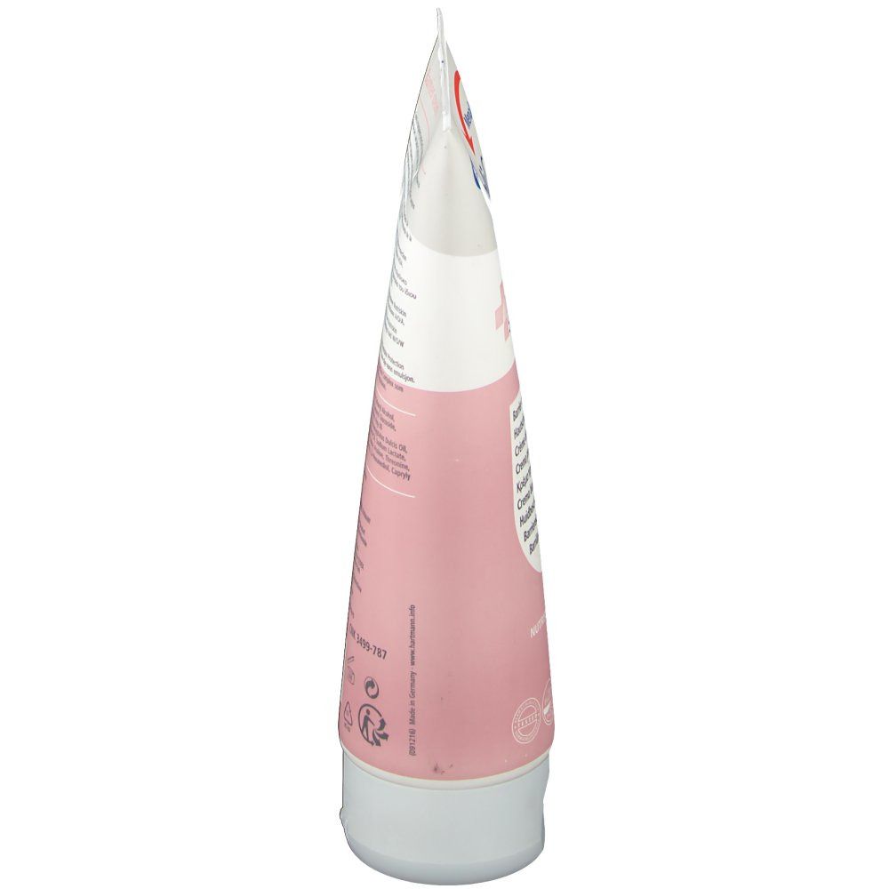 Seitenansicht der Tube MoliCare Skin. Weiß-rosa Farbverlauf. Aufschrift und Produktnamen.