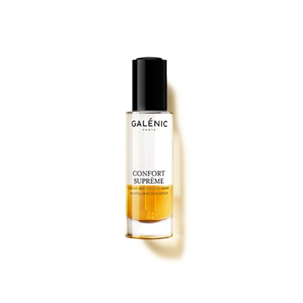 Flacon de sérum Galénic. Étiquette blanche, bouchon noir. Texte: Confort Suprême, Sérum Duo Revitalisant.