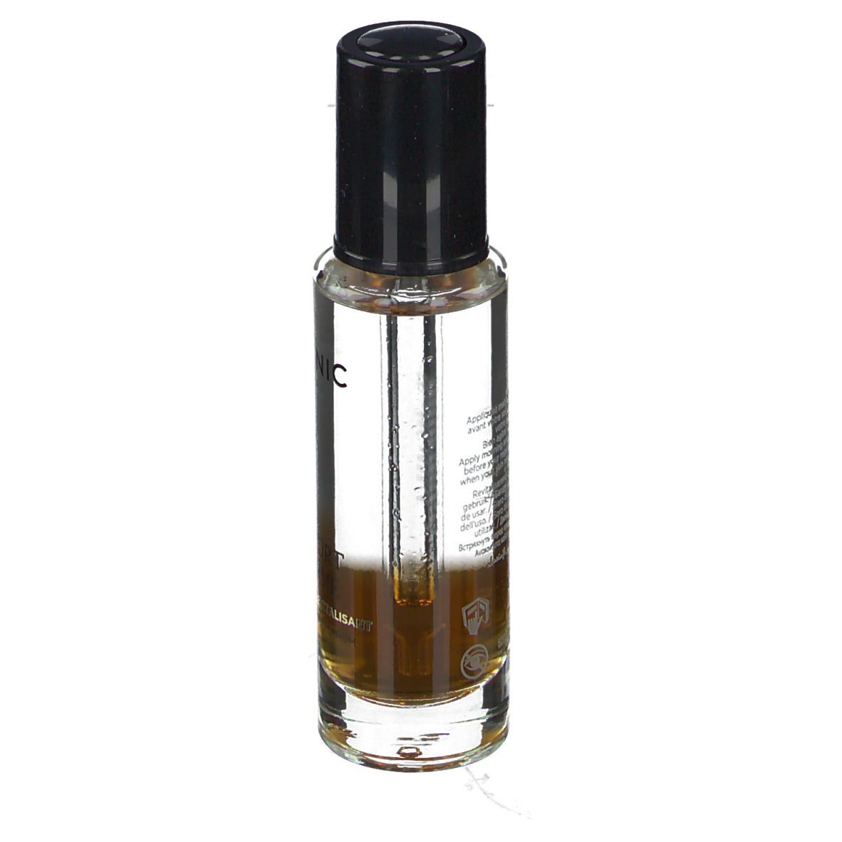 Flacon de sérum Galénic, bouchon noir. Verre transparent, liquide visible. Texte: Galénic, Confort Suprême.