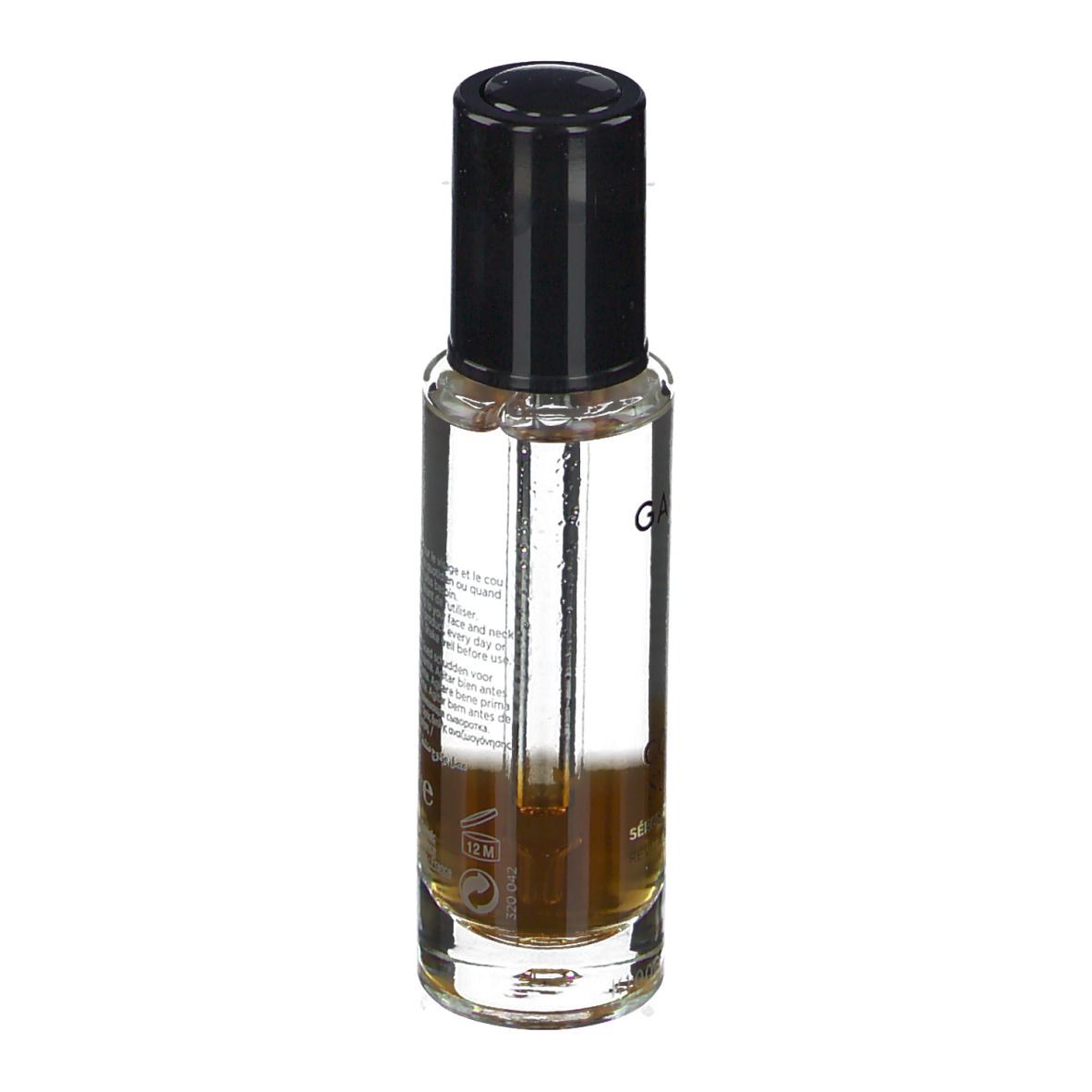Flacon de sérum Galénic, bouchon noir. Verre transparent, liquide visible. Texte: Galénic, Confort Suprême.