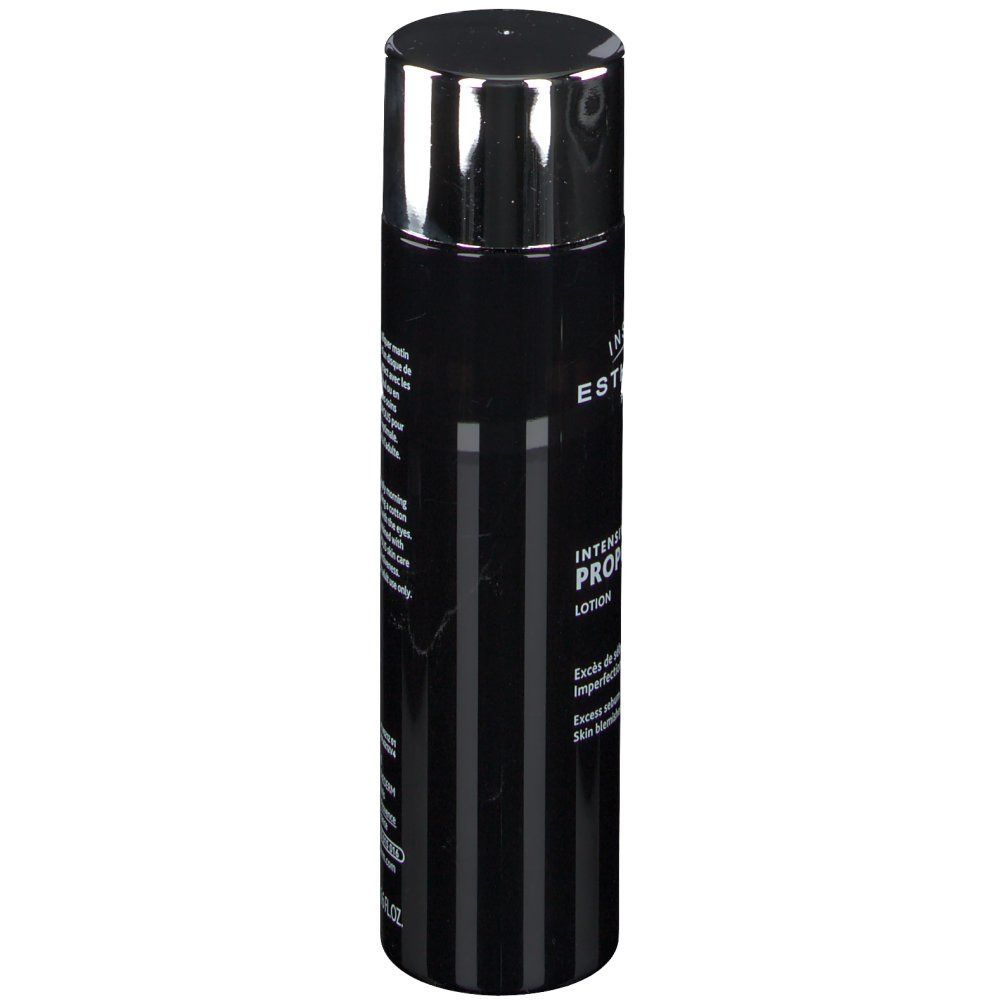 Flacon noir, bouchon argenté. Rayures verticales. INSTITUT ESTHEDERM PARIS. Inscription: Intensiv Propolis Lotion.