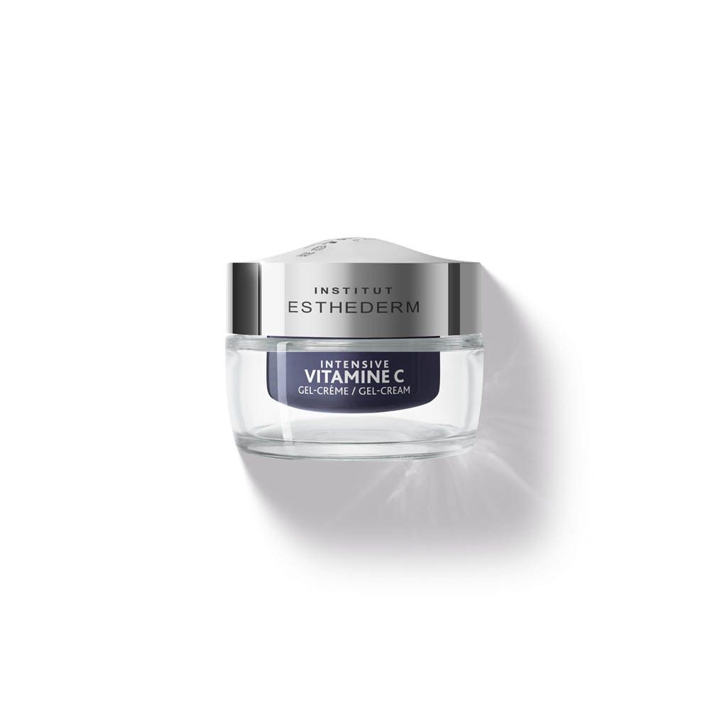 Pot de crème bleu foncé avec couvercle argenté. Inscription : INSTITUT ESTHEDERM, INTENSIVE VITAMINE C GEL-CRÈME / GEL-CREAM.