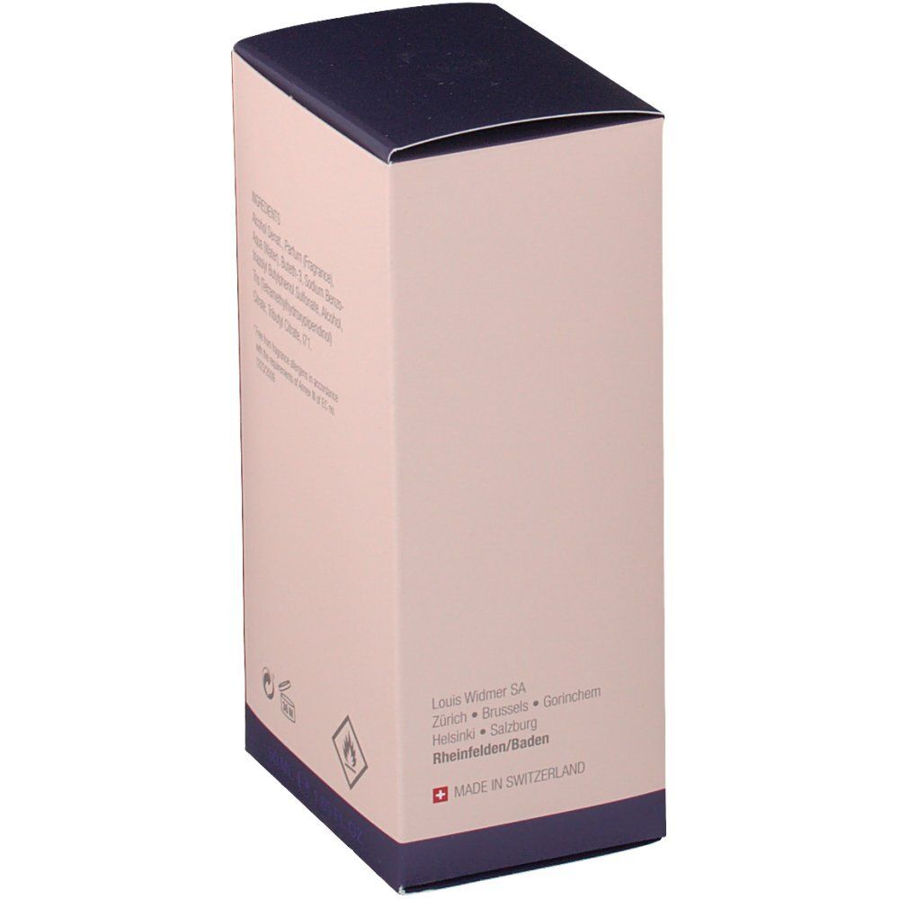 Côté de l'emballage en carton. Inscription: Louis Widmer SA, Zurich, Suisse. Pictogrammes: pot ouvert, flamme. Texte: MADE IN SWITZERLAND.