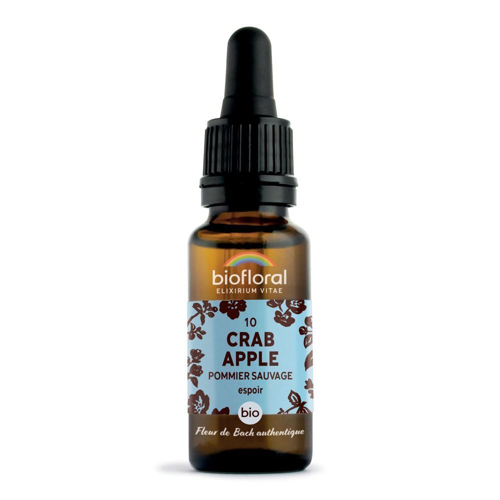 Bruine glazen fles met druppelaar. Etiket met productnaam, bloemmotief en bio-label.