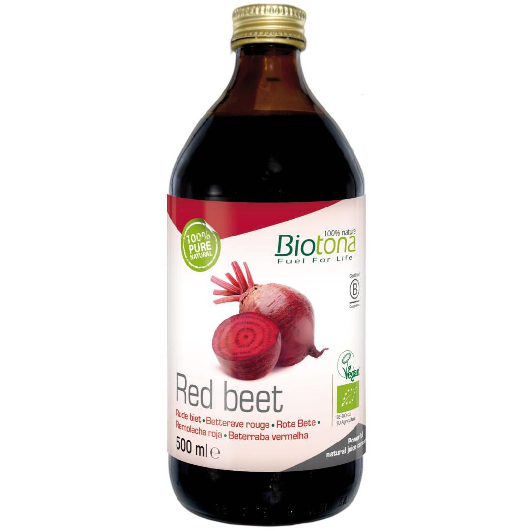 Bouteille en verre contenant un liquide rouge. Étiquette avec nom du produit, illustration de betterave et logos. Bouchon doré.