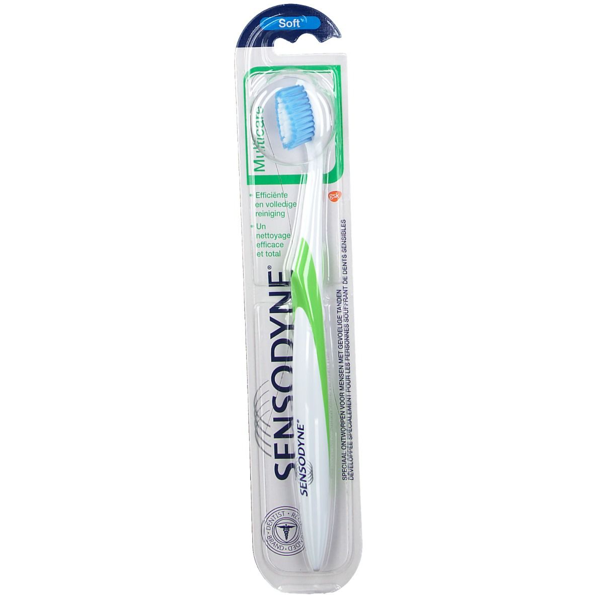 Tandenborstel in verpakking. Witte handgreep met groene accenten, blauwe borstelkop. "SENSODYNE" en "MultiCare" zichtbaar.