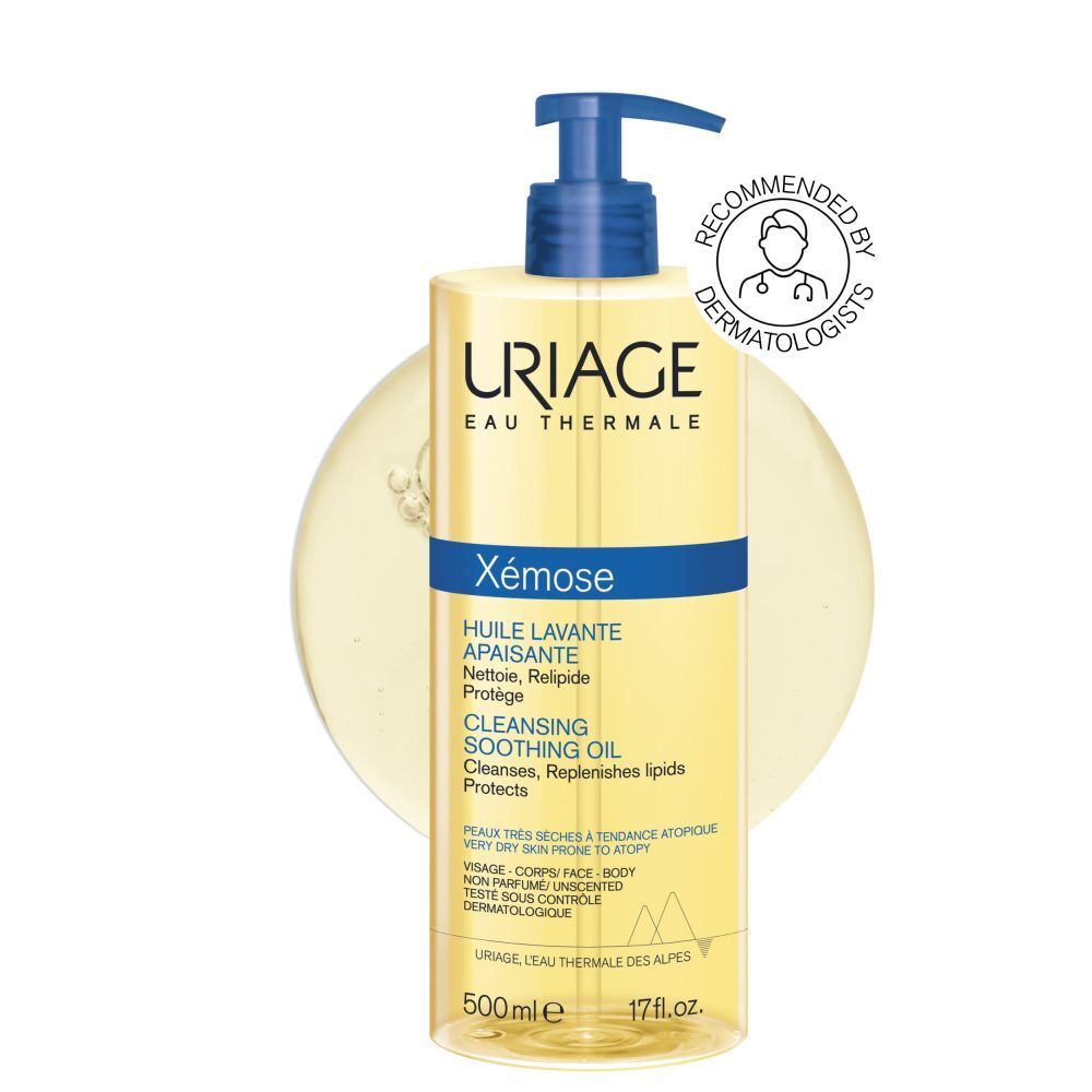 Uriage Xémose reinigingsolie. Gele fles met blauwe pomp. Tekst: Xémose, Cleansing Soothing Oil, 500ml.