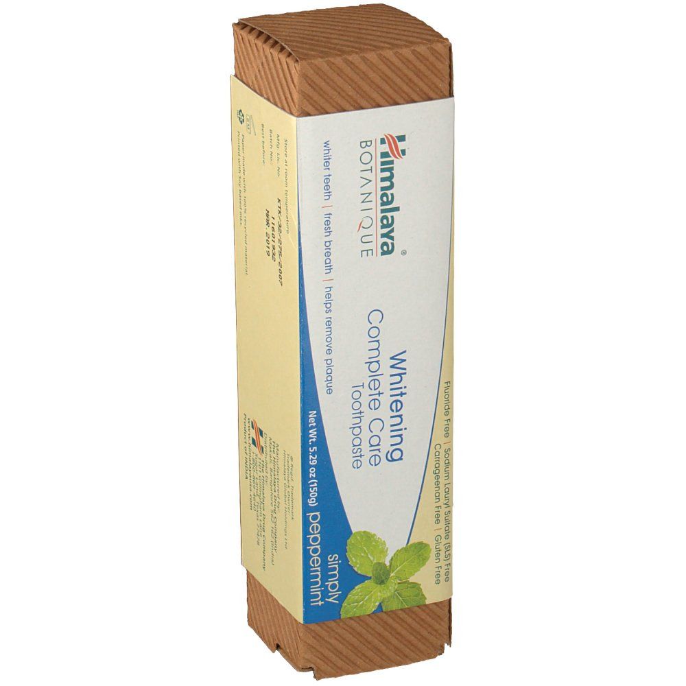 Confezione dentifricio Himalaya BOTANIQUE. Bianco, blu e marrone. Testo: Whitening Complete Care, menta piperita.
