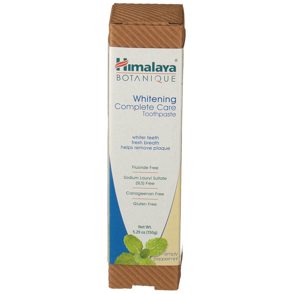 Confezione dentifricio Himalaya BOTANIQUE. Bianco, blu e marrone. Testo: Whitening Complete Care, menta piperita.