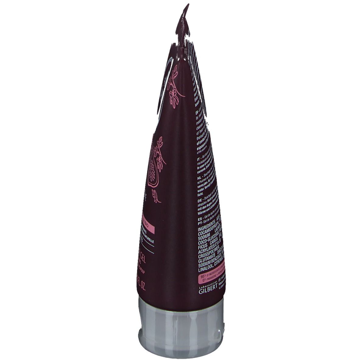 Haut du tube marron avec texte et illustration de figue. Fermeture transparente. Nom du produit et marque non visibles.