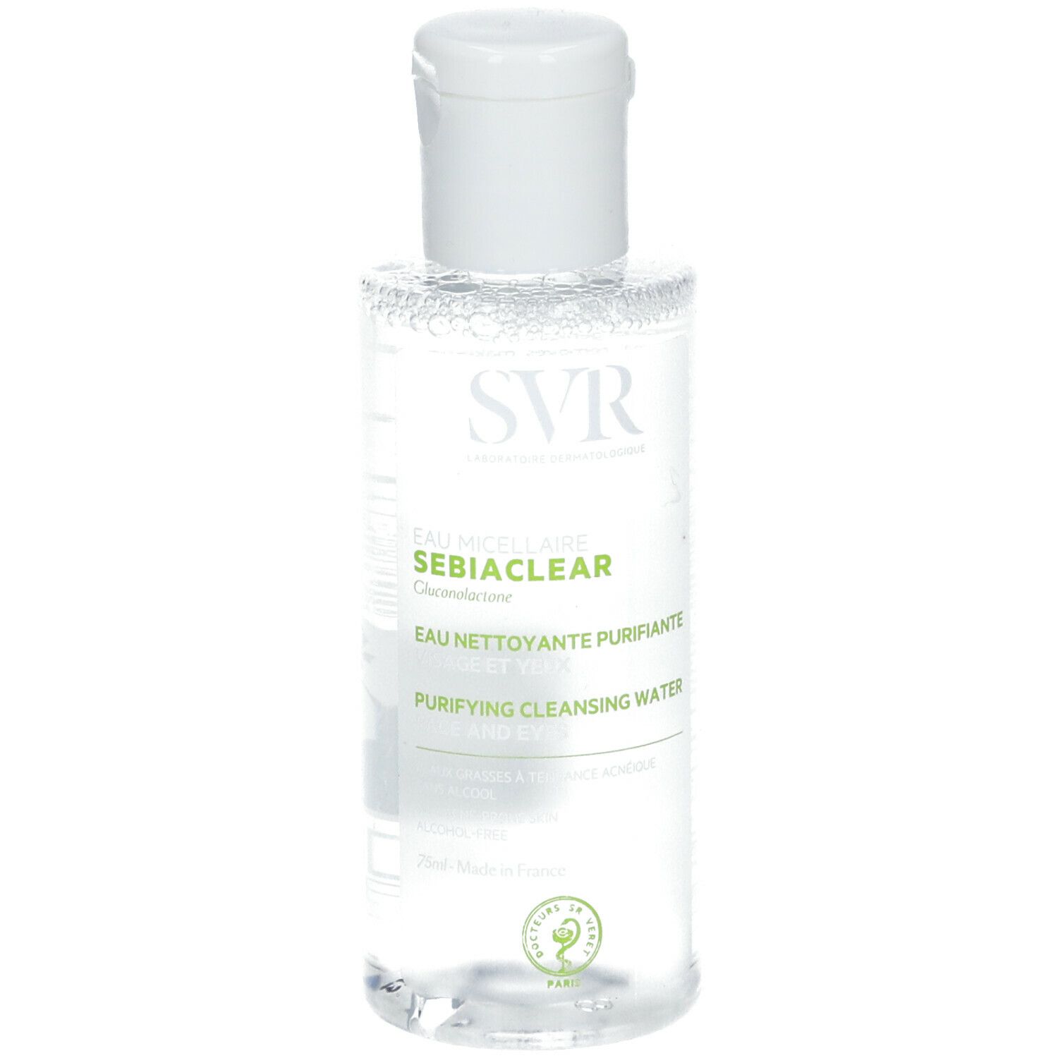 Flacon transparent avec bouchon blanc. Inscriptions: SVR SEBIACLEAR, Eau Micellaire, Eau Nettoyante Purifiante, Purifying Cleansing Water.