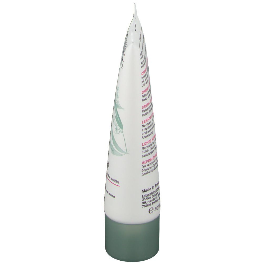 Creme-Tube, Seitenansicht. Weiß mit grüner Kappe. Text: Crème Légère Hydratante, Moisturizing Light Cream, Inhaltsstoffe.