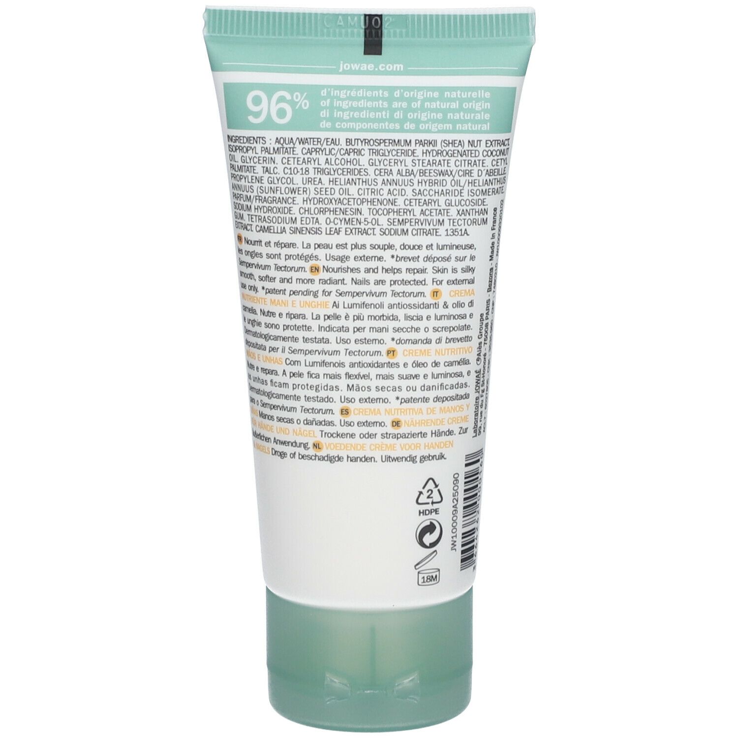 Dos du tube de crème. Texte. Ingrédients. 96% d'ingrédients d'origine naturelle. Vert et blanc.