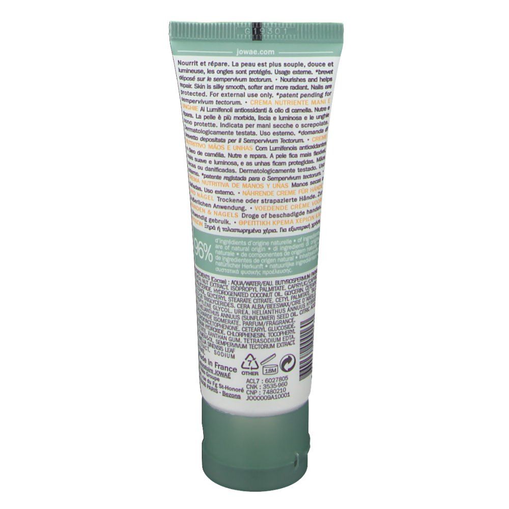Dos du tube de crème. Texte. Ingrédients. 96% d'ingrédients d'origine naturelle. Vert et blanc.