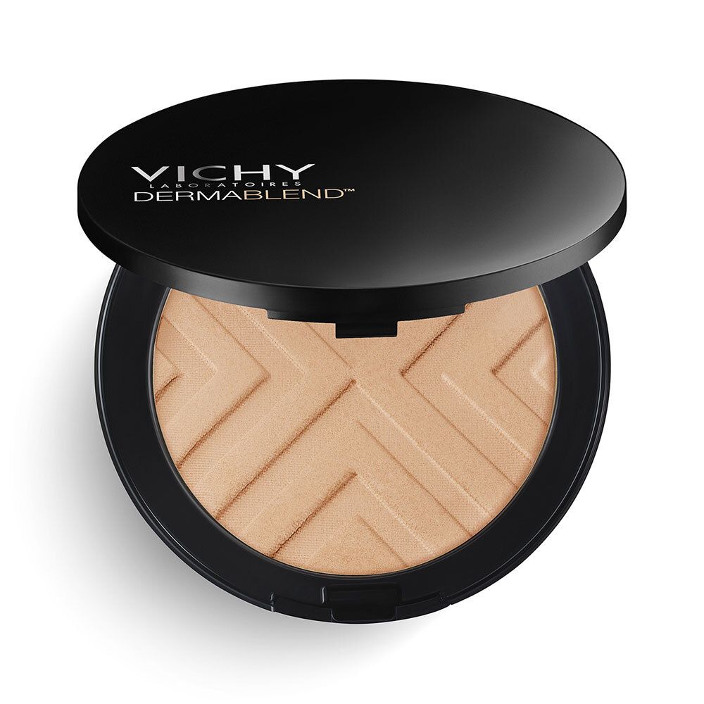 Ronde, zwarte VICHY DERMABLEND Covermatte poedercompact, open. Beige poeder met geometrisch patroon.
