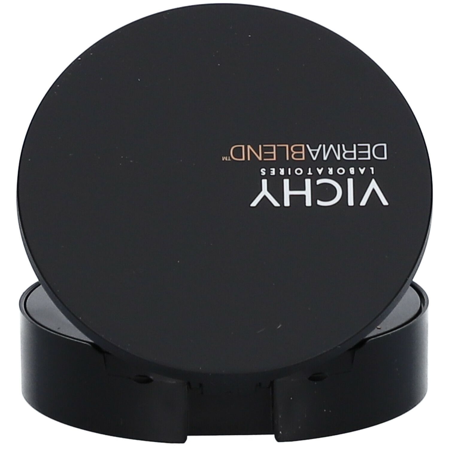 Boîtier de poudre compacte noir et rond. "VICHY DERMABLEND" en blanc sur le couvercle.