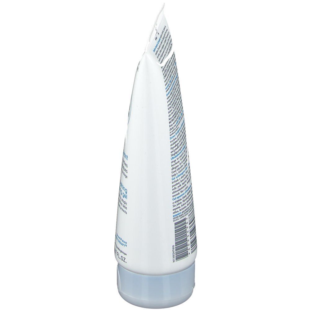 Witte tube, zijaanzicht. Blauwe strepen en tekst. Blauwe dop. Opschrift: BIODERMA, Atoderm Intensive Gel moussant.