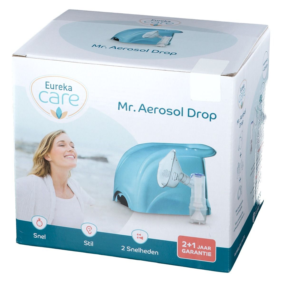 Boîte Eureka Care Mr. Aerosol Drop. Appareil bleu, femme souriante. Inscriptions : 'Snel', 'Stil', '2 snelheden' et '2+1 jaar garantie'.