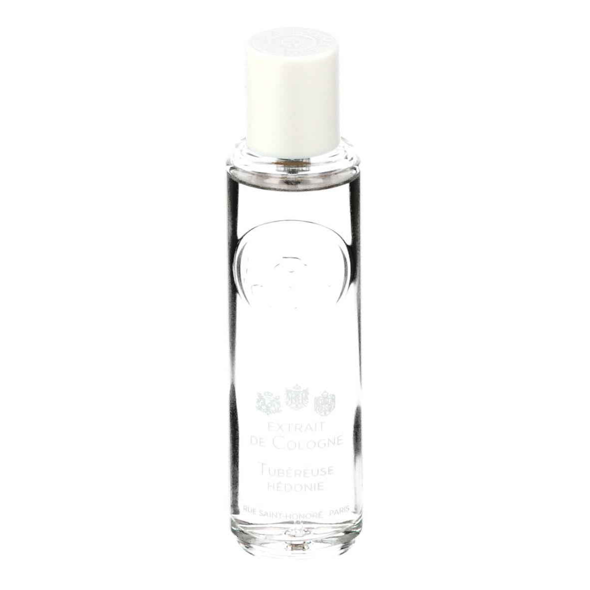 Flacon cylindrique avec bouchon blanc. Inscription: Extrait de Cologne, Tubéreuse Hédonie. Liquide clair.