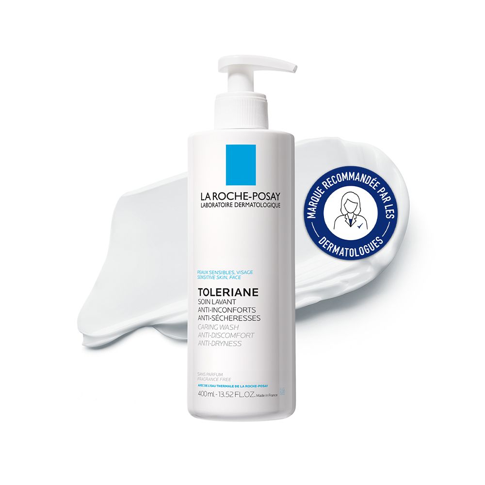 Flacon blanc avec pompe. Inscription: La Roche-Posay, Toleriane, Caring Wash. Avec sceau dermatologues.