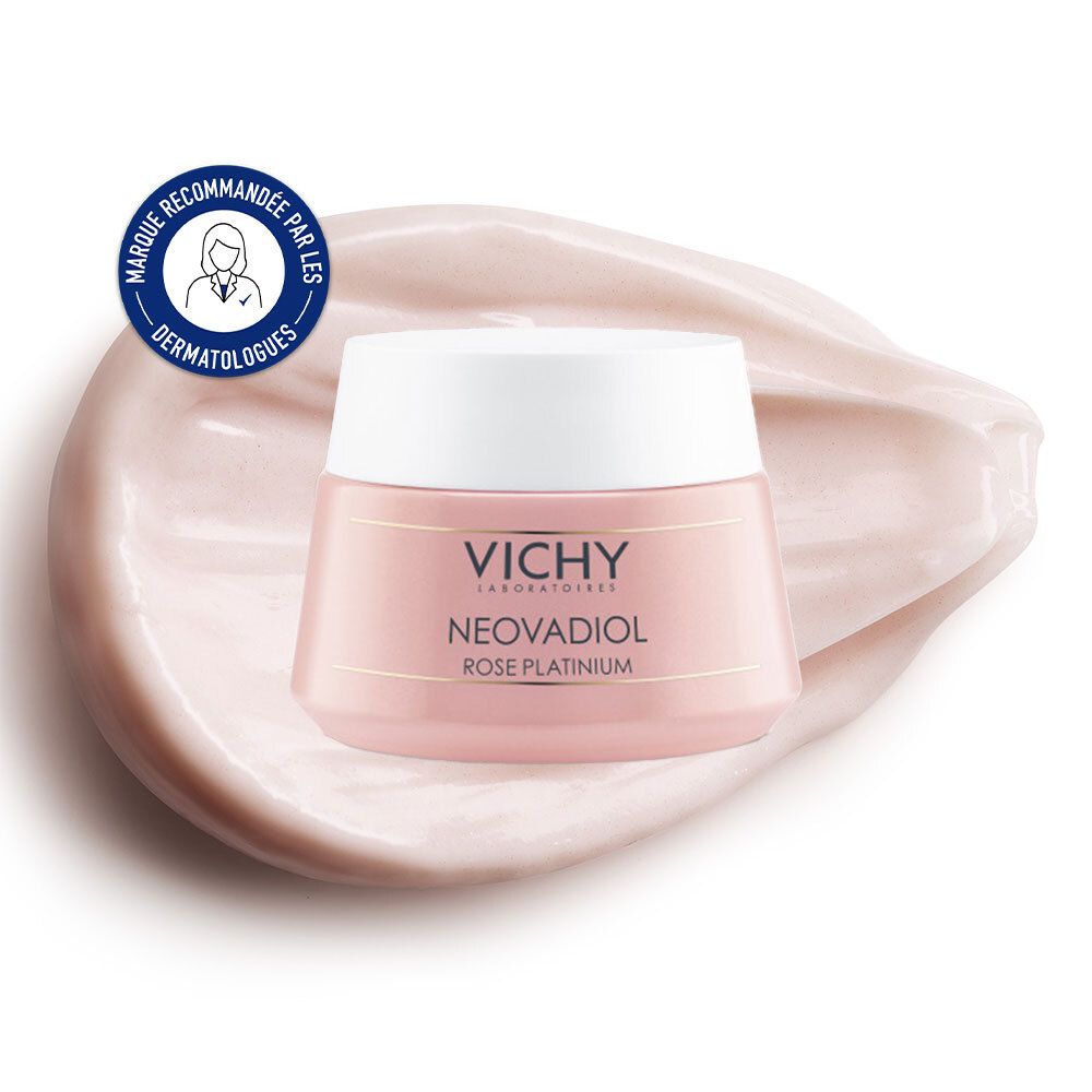 Pot de crème rose avec couvercle blanc, posé sur une base de crème. Logo et texte : Vichy, Neovadiol, Rose Platinium. Sceau.