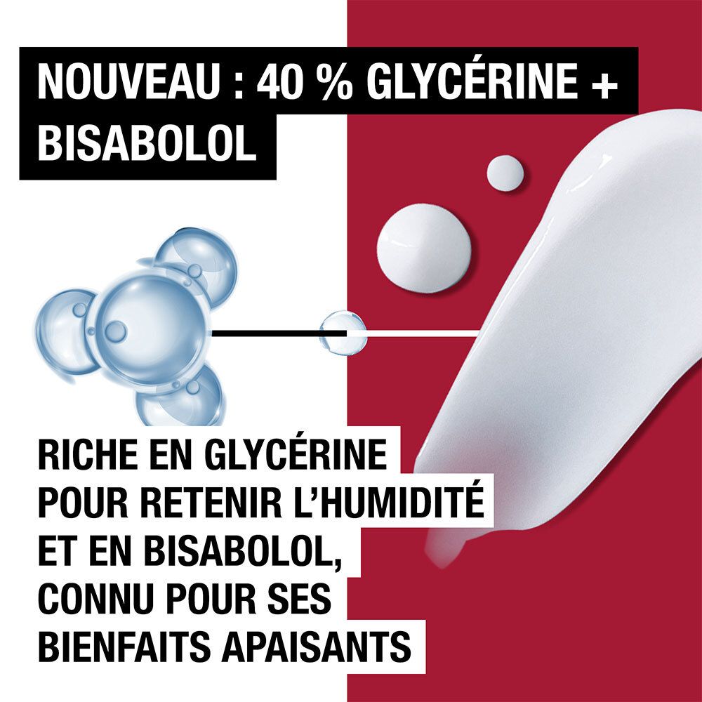 Nahaufnahme von weißen Creme-Tropfen. Text: Riche en glycérine pour retenir l'humidité et en bisabolol, connu pour ses bienfaits apaisants.