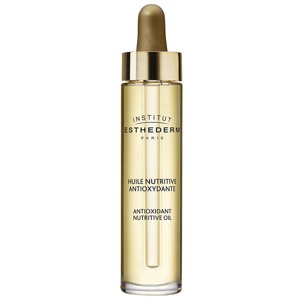 Klare Glasflasche mit goldfarbenem Deckel und Pipette. Aufschrift: INSTITUT ESTHEDERM PARIS, Huile nutritive antioxydante.