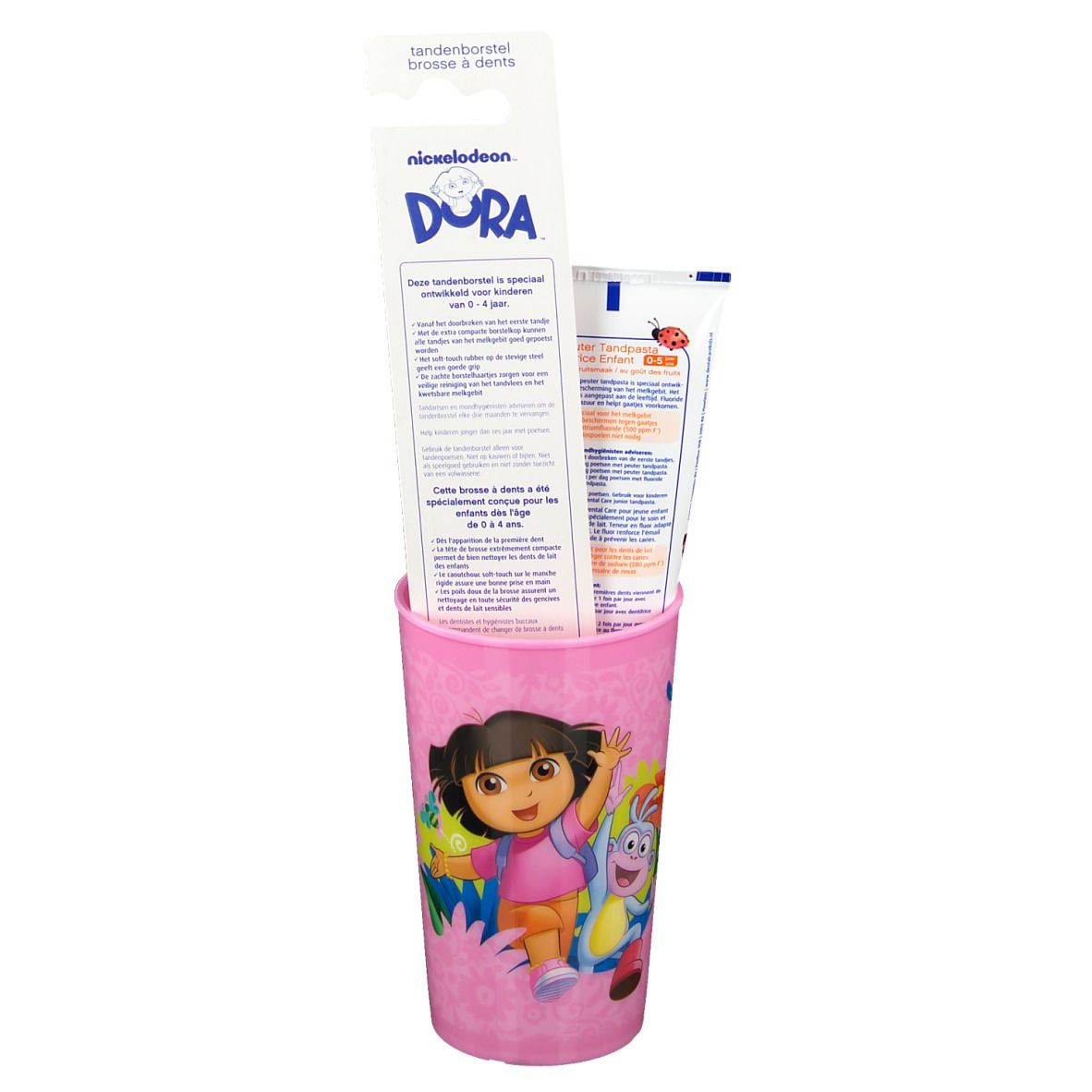 Roze Dora-beker, tandenborstel en tandpasta. Tandenborstel en tandpasta verpakt.