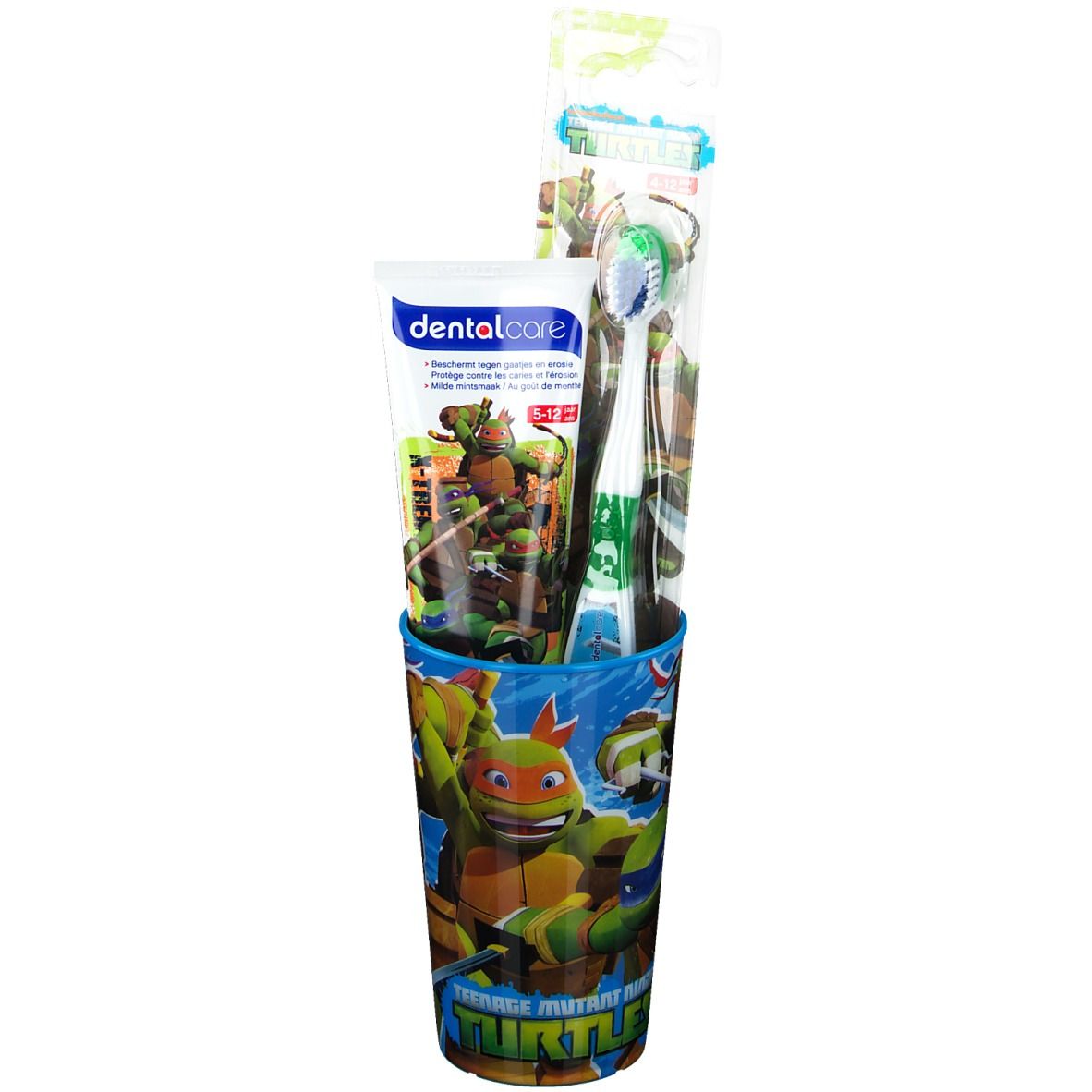 Zahnpflege-Set mit Becher, Zahnbürste und Zahnpasta. Becher mit Teenage Mutant Ninja Turtles-Motiv. Zahnbürste und Zahnpasta in Verpackung.