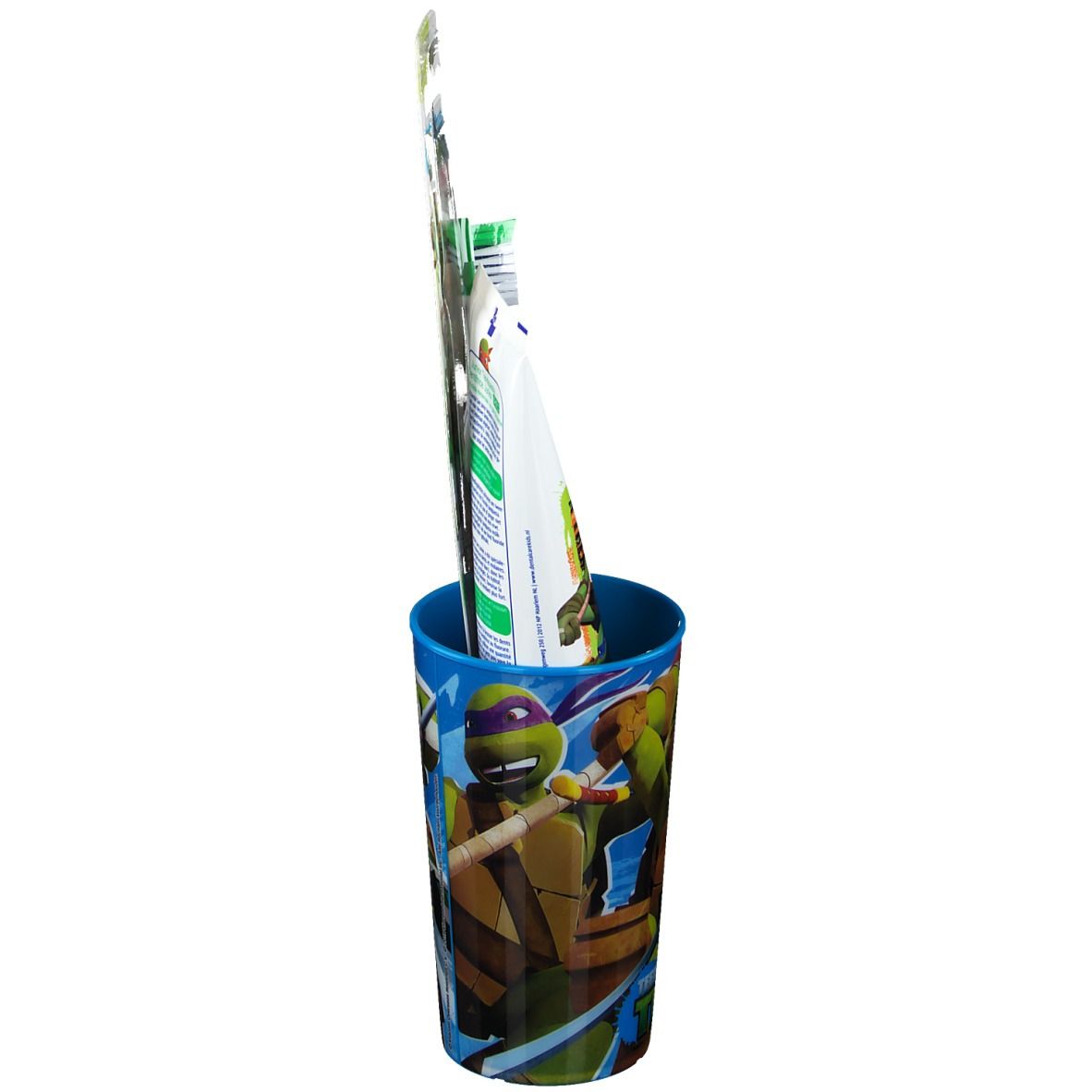 Rückansicht des Zahnpflege-Sets. Becher mit Teenage Mutant Ninja Turtles-Motiv. Zahnbürste und Zahnpasta in Verpackung.