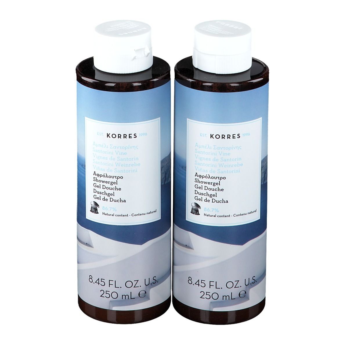 Deux flacons de gel douche avec bouchons blancs. Inscription : Korres, 8.45 FL. OZ. U.S. 250 mL.