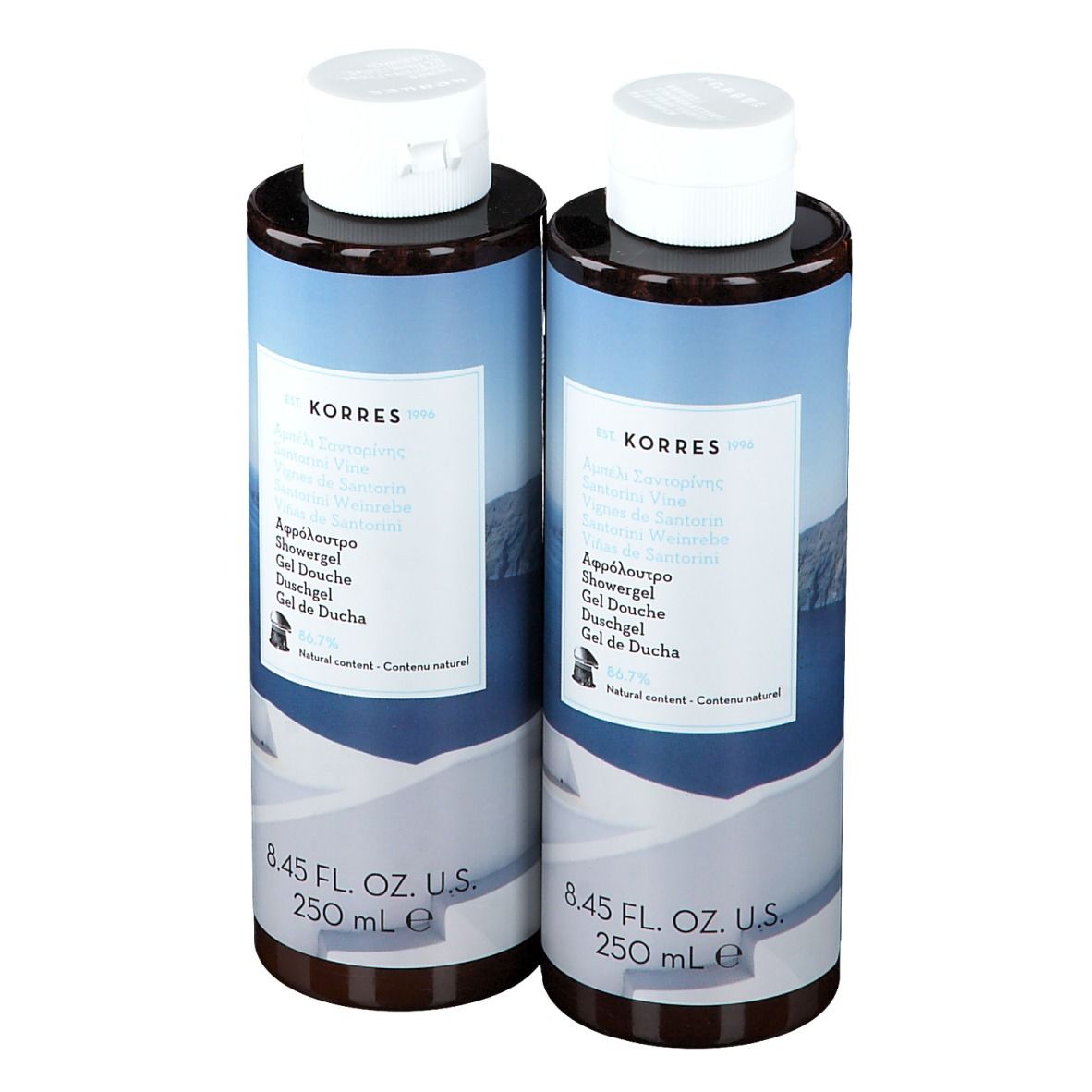 Deux flacons de gel douche avec bouchons blancs. Inscription : Korres, 8.45 FL. OZ. U.S. 250 mL.
