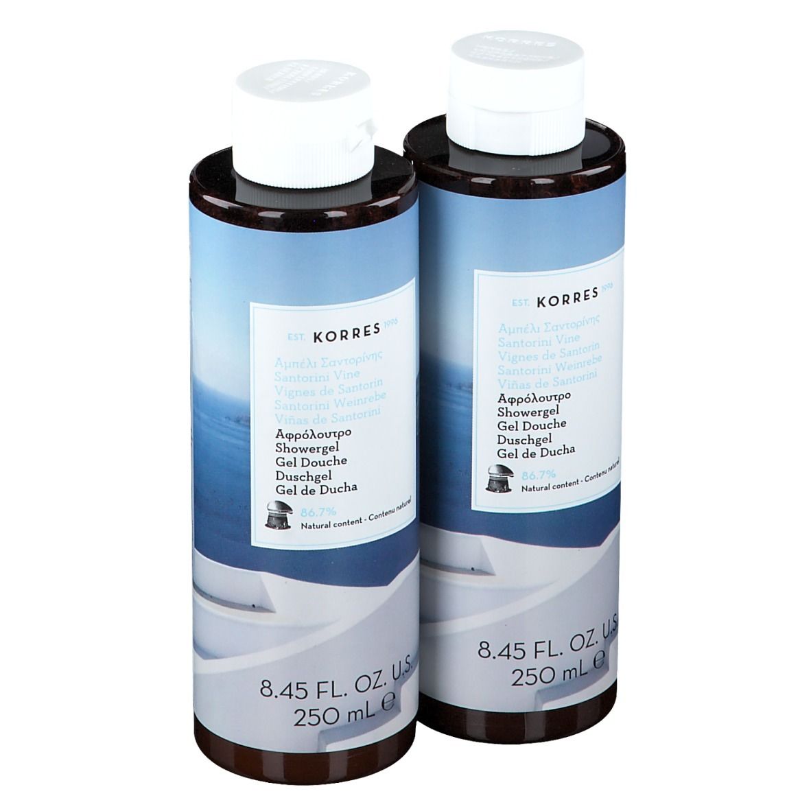 Deux flacons de gel douche avec bouchons blancs. Inscription : Korres, 8.45 FL. OZ. U.S. 250 mL.