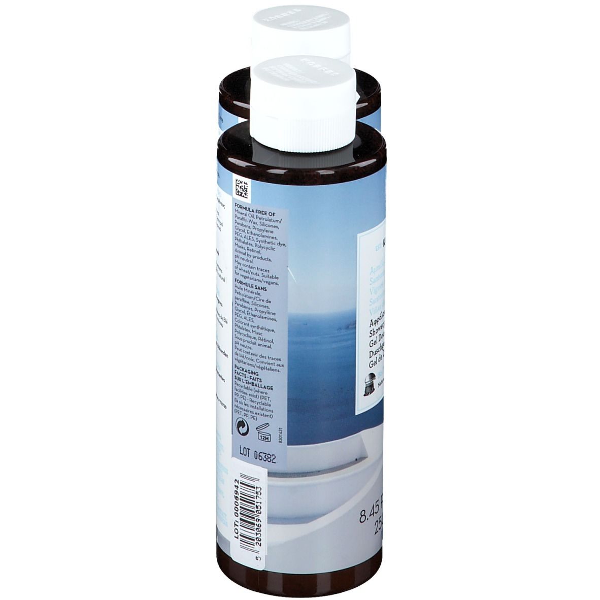 Deux flacons de gel douche, vue latérale arrière. Bouchons blancs, corps marron, étiquettes.