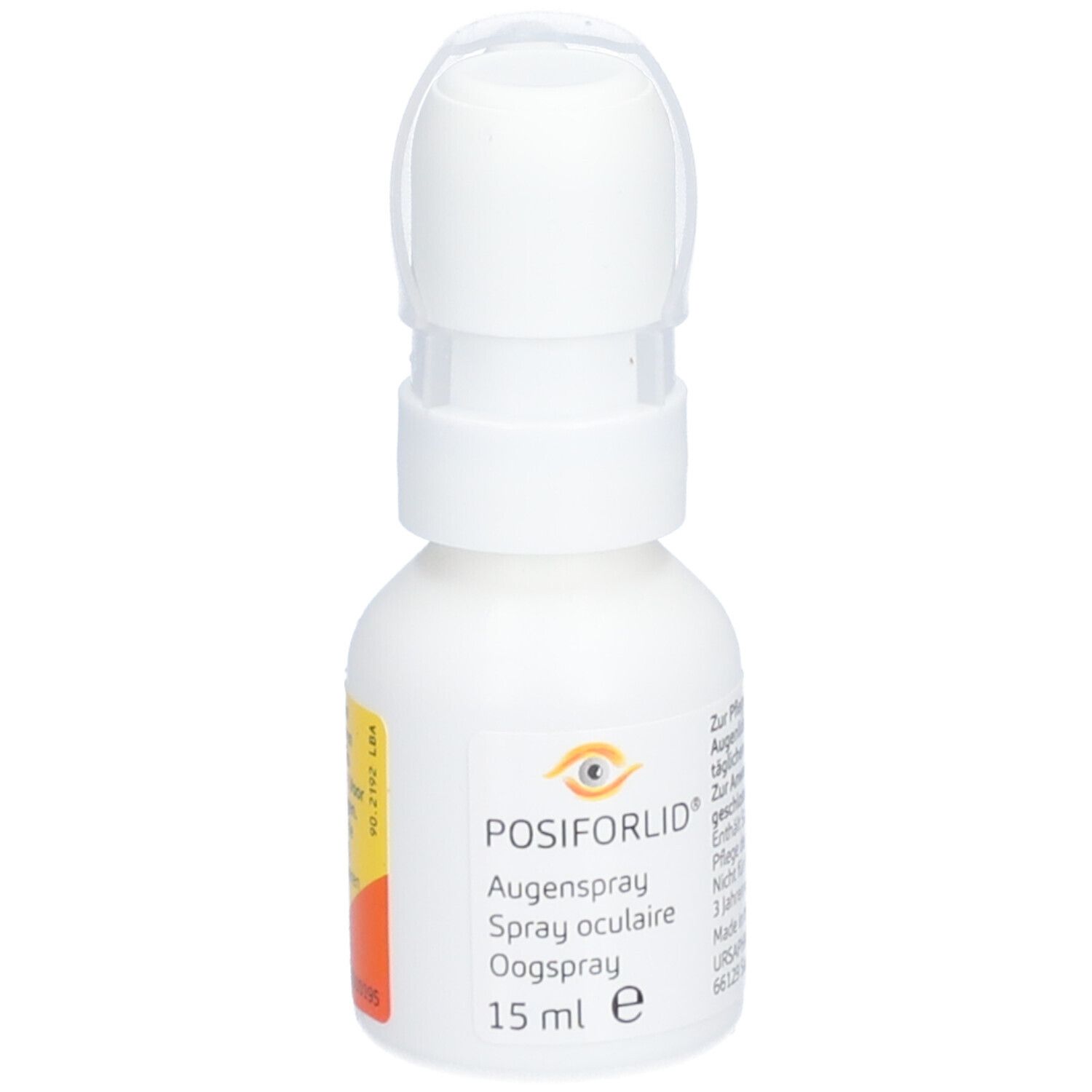 Witte sprayfles met klapdeksel. Opschrift: Posiforlid Oogspray, Spray oculaire, Augenspray. 15 ml.