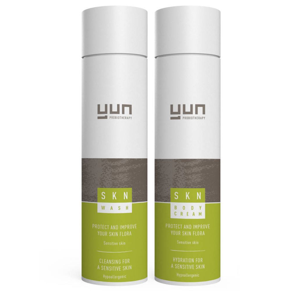Deux flacons blancs, détails marron et vert. Inscription YUN. Produits: SKN Wash et SKN Body Cream. Texte: Protect and improve your skin flora.