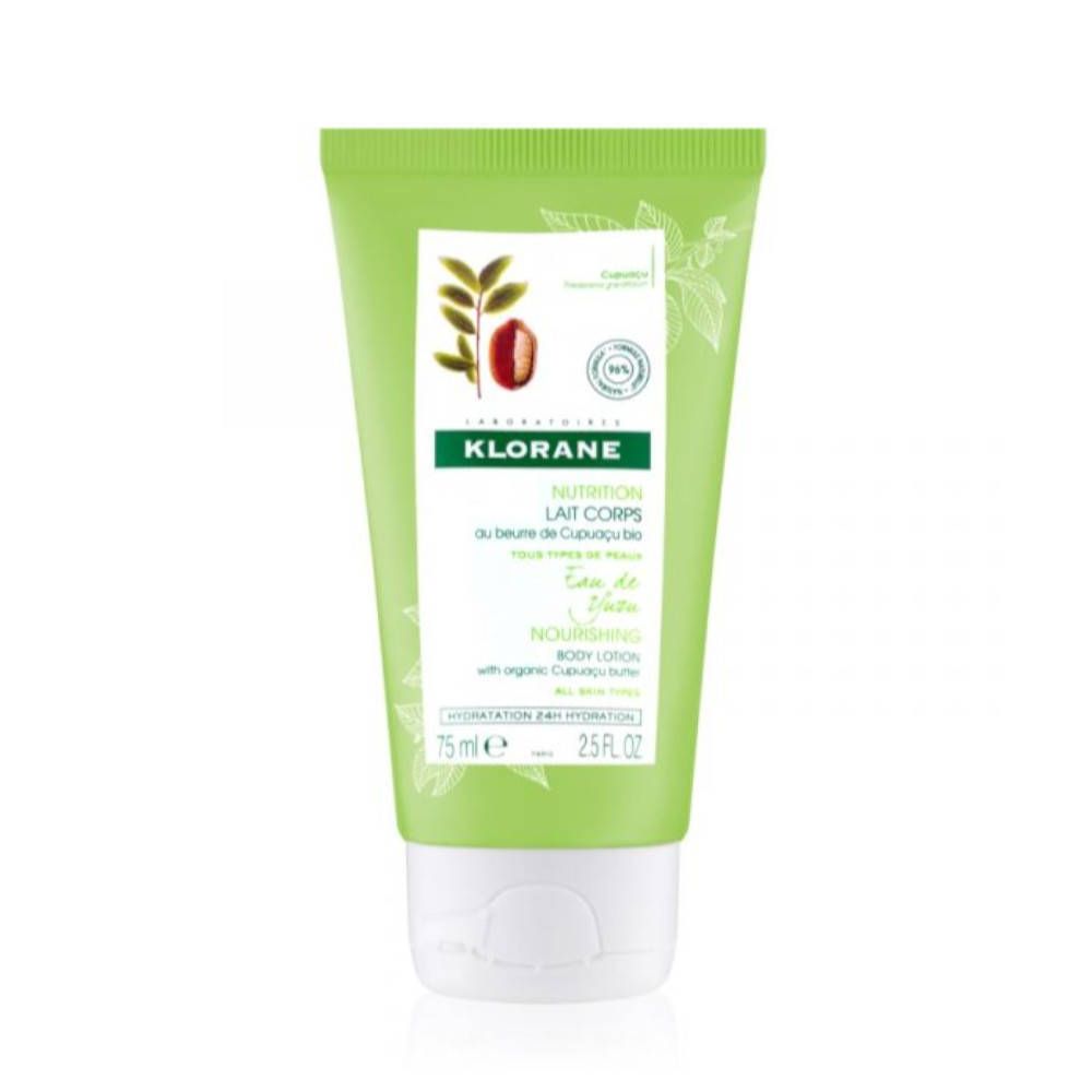 Tube vert de lotion KLORANE. Inscription: Nutrition Lait Corps. Au beurre de Cupuaçu bio. 75 ml.