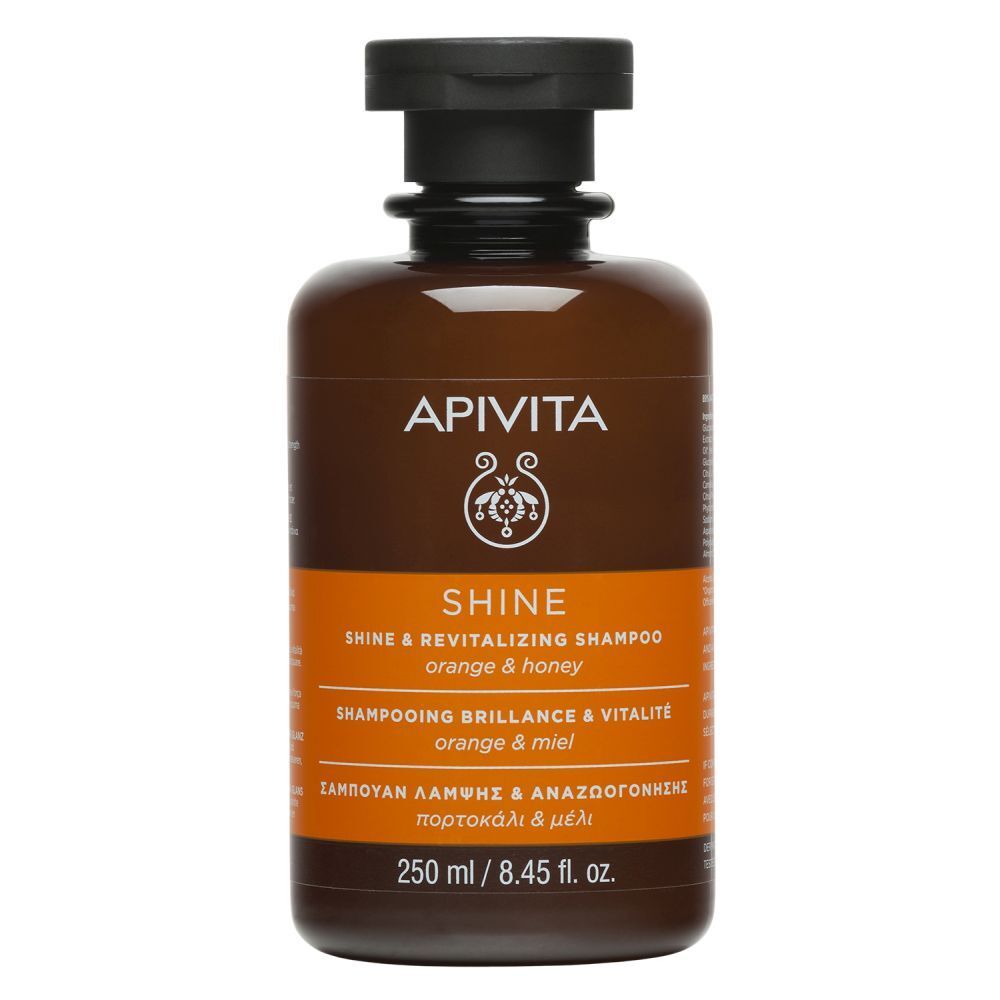 Bruine shampoo fles. Zwarte dop. Opschrift: APIVITA SHINE. Sinaasappel & honing. 250 ml.