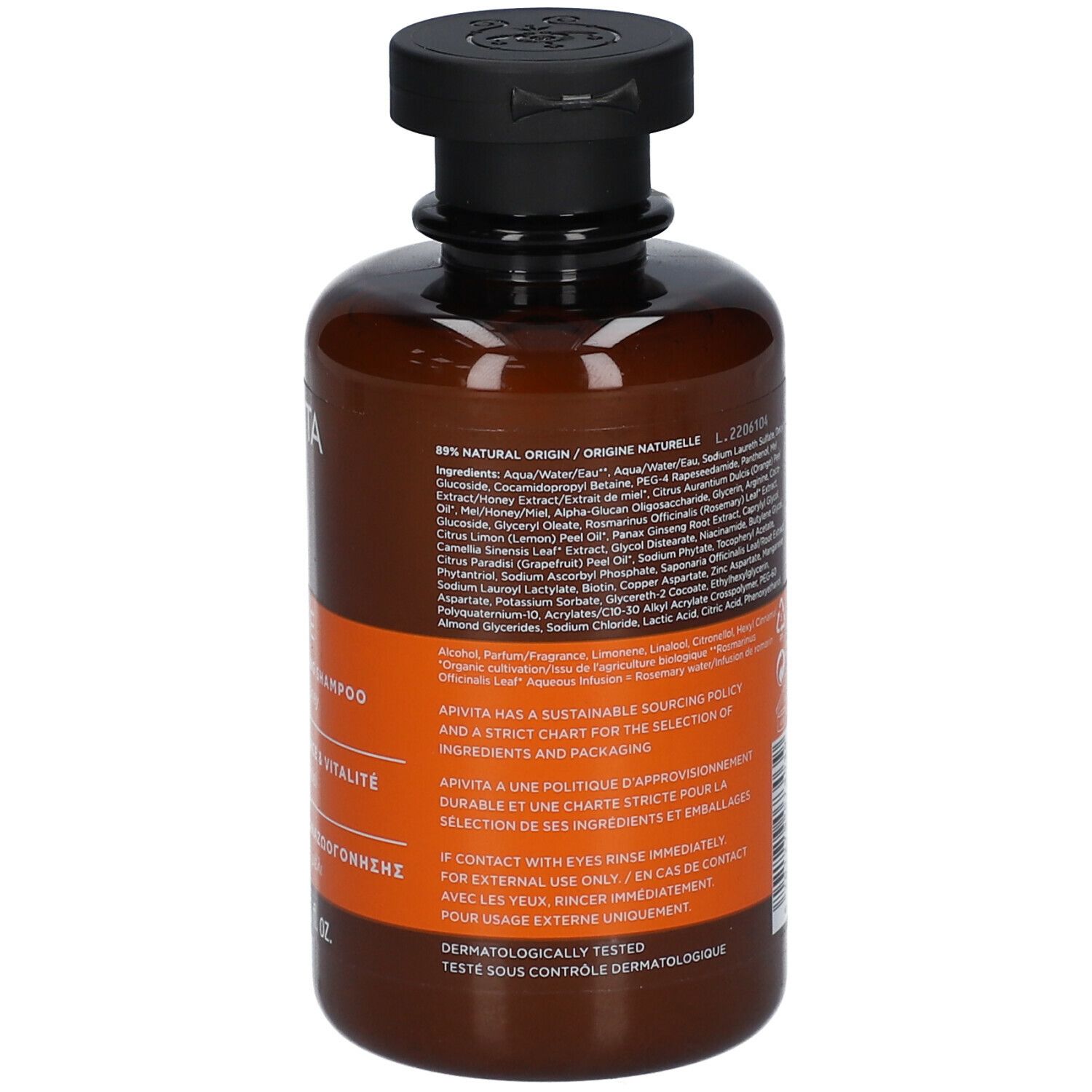 Rückseite der Shampoo-Flasche. Text in mehreren Sprachen. Inhaltsstoffe und Informationen zum Produkt.