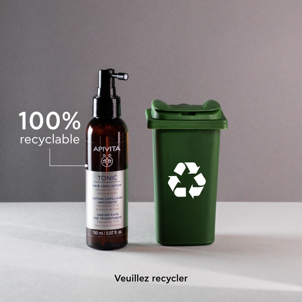 Produit et symbole de recyclage. Inscriptions: APIVITA, TONIC, Hair Loss Lotion.