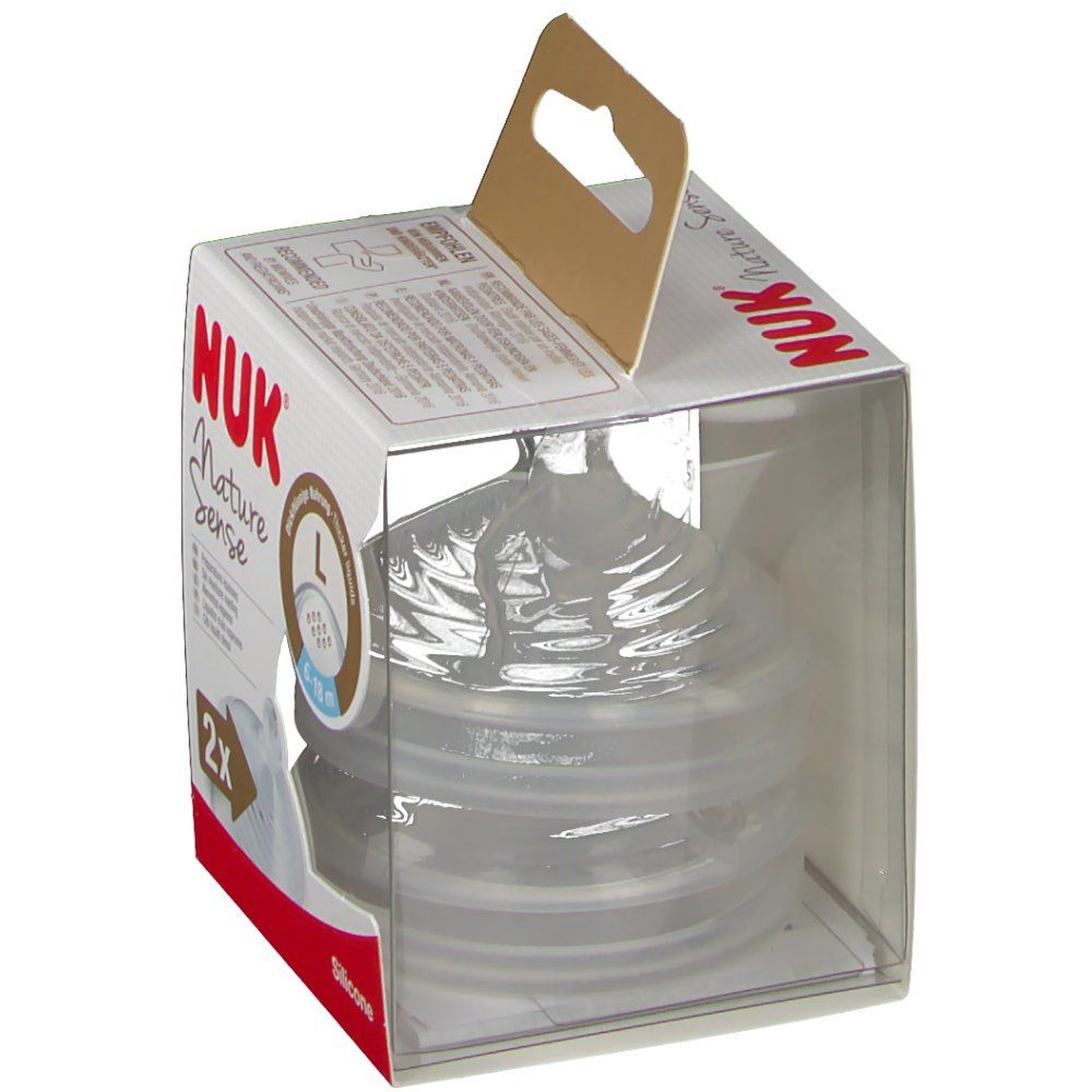 Paquet avec deux tétines en silicone transparentes. Inscription: NUK Nature Sense. Fenêtre transparente.