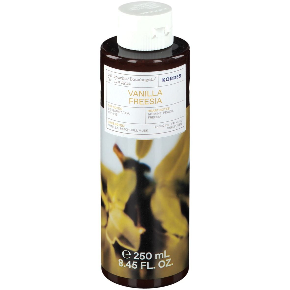 Flacon marron avec bouchon blanc. Inscription : Korres Vanilla Freesia. Étiquette avec motif floral et informations produit.