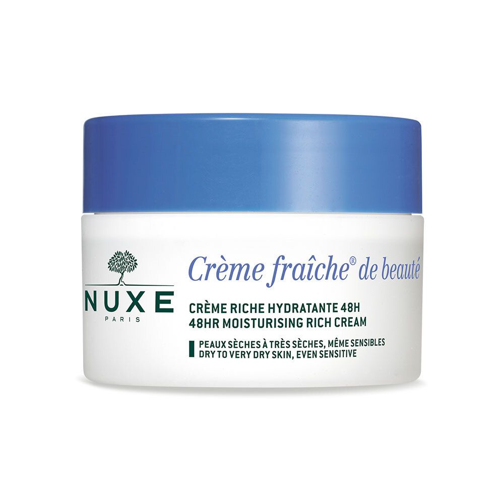 Pot de crème avec couvercle bleu. Inscription : Crème fraîche de beauté, NUXE Paris. Texte : 48HR moisturizing rich cream, pour peaux sèches.