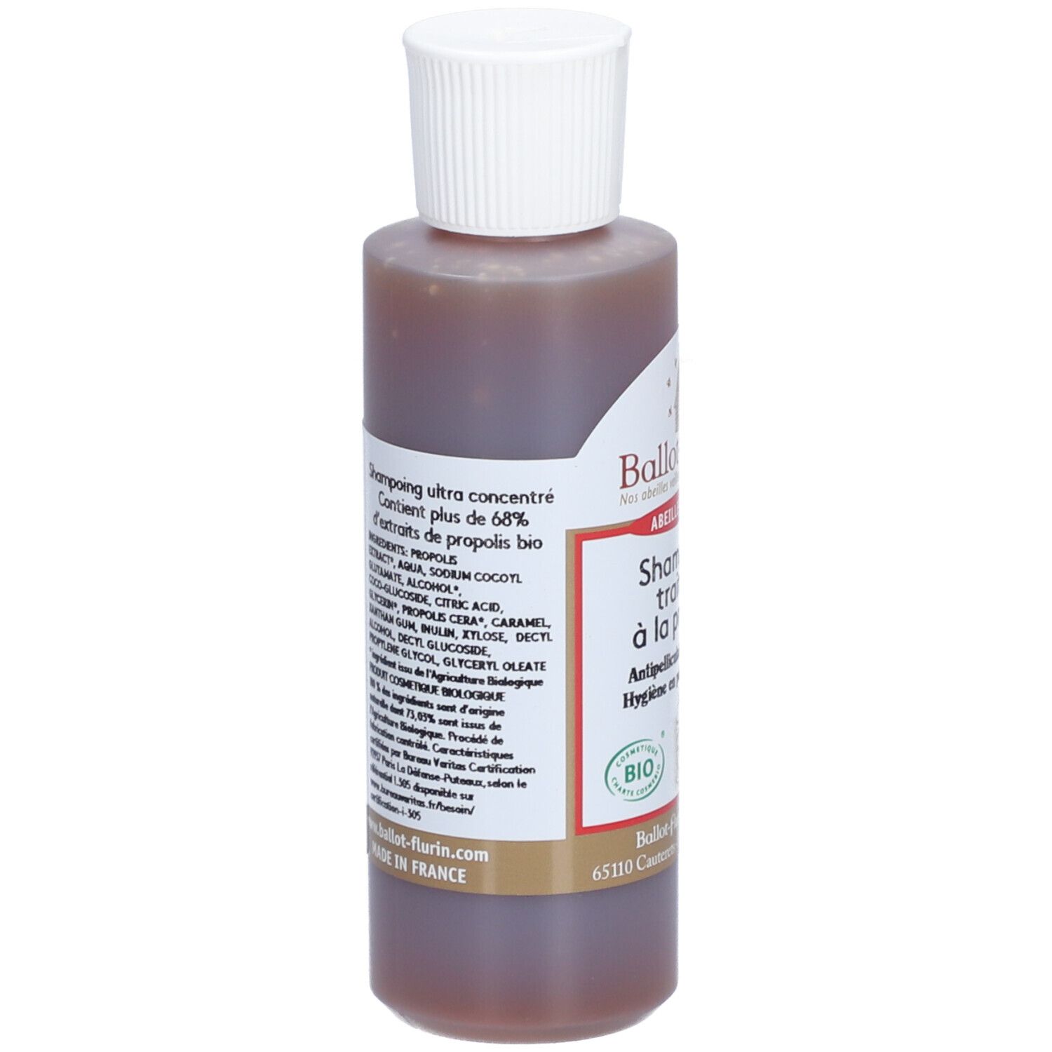 Braune Flasche mit weißem Deckel. Etikett mit Inhaltsstoffen und Text: Ballot-Flurin, Shampoing traitant à la propolis. Bio-Zertifizierung.