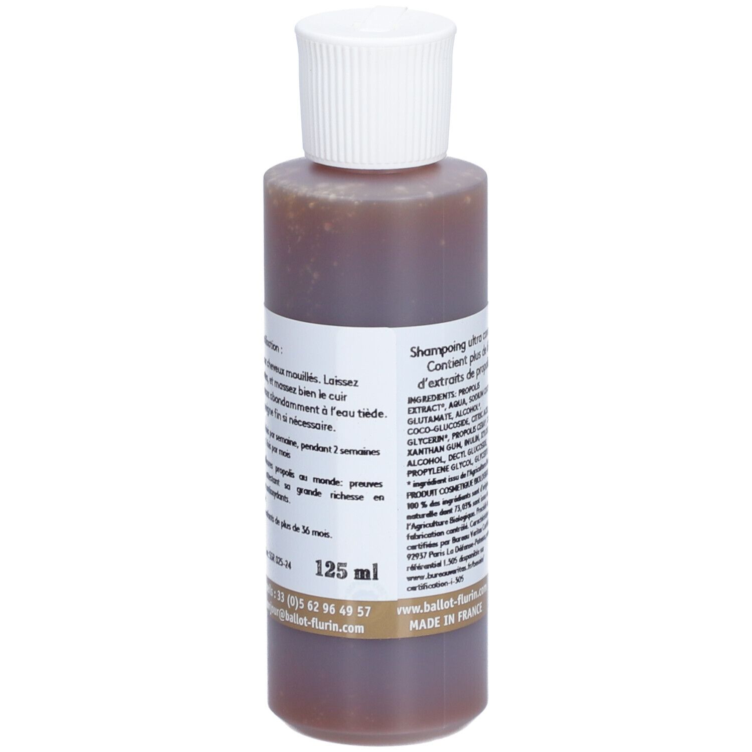 Braune Flasche mit weißem Deckel. Etikett mit Text und Volumen: 125 ml. Ballot-Flurin, Shampoing traitant à la propolis.