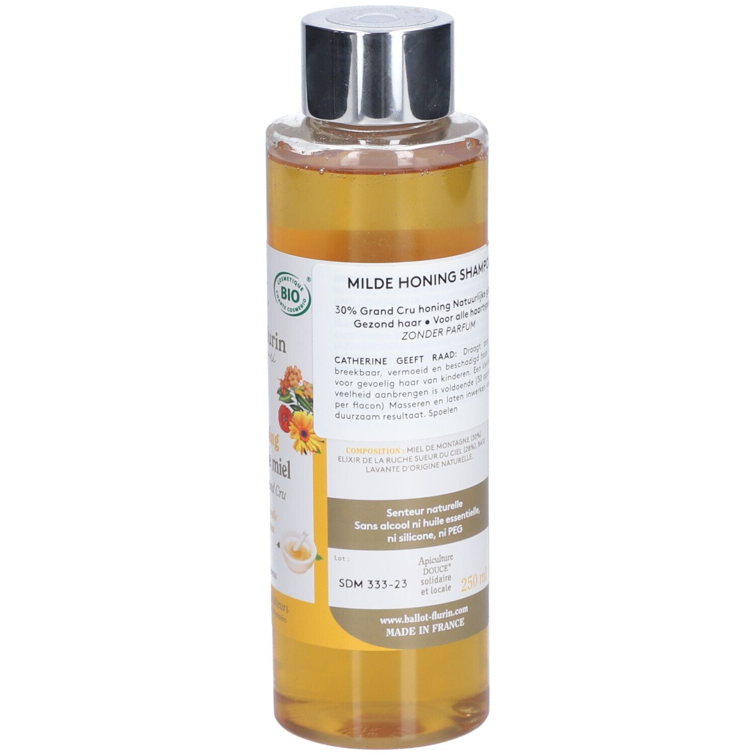 Rückseite der Shampoo-Flasche. Text mit Produktinformationen. Gelber Hintergrund. Herstellerlogo.