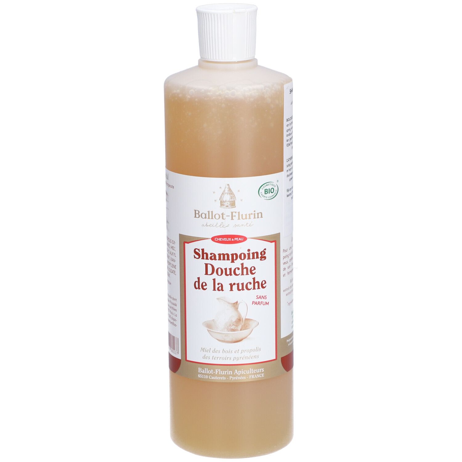 Flacon de shampoing douche beige. Bouchon blanc. Étiquette avec logo et texte. Certification bio.