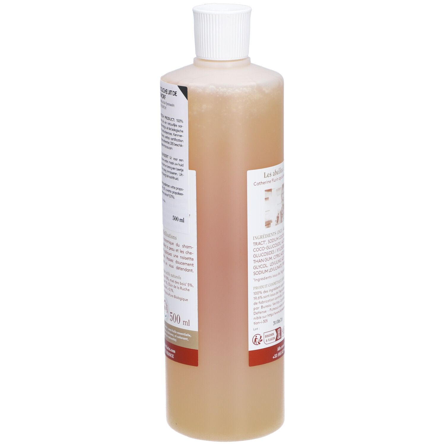Flacon de liquide beige. Étiquette avec ingrédients et texte. 500 ml. Certification bio.