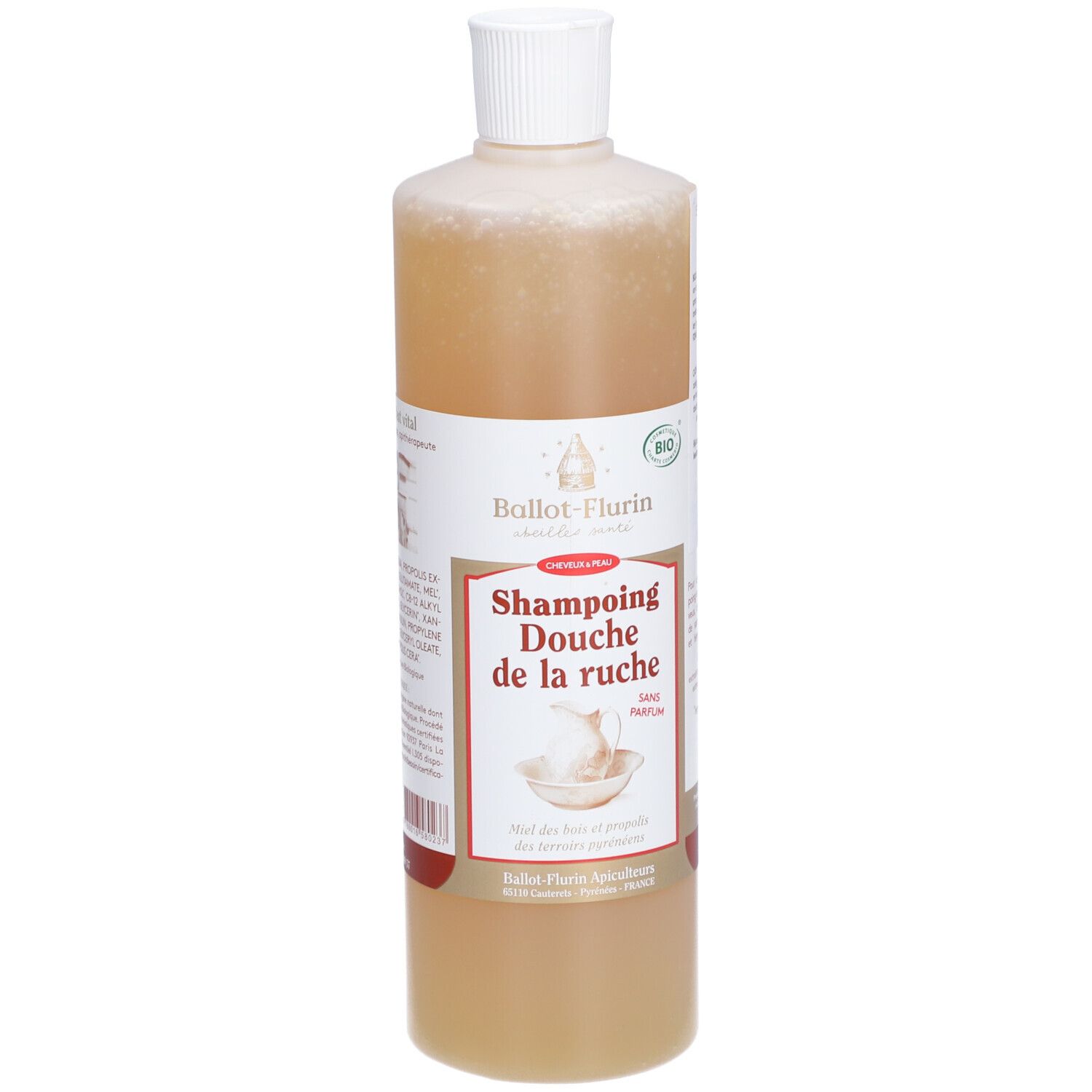 Flacon de liquide beige. Bouchon blanc. Étiquette avec logo et texte. Certification bio.