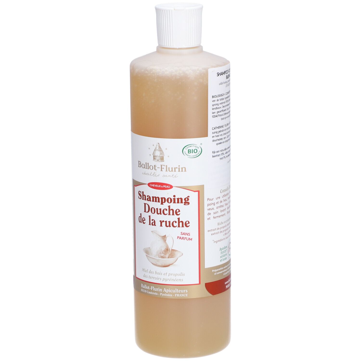 Flacon de liquide beige. Bouchon blanc. Étiquette avec logo et texte. Certification bio.